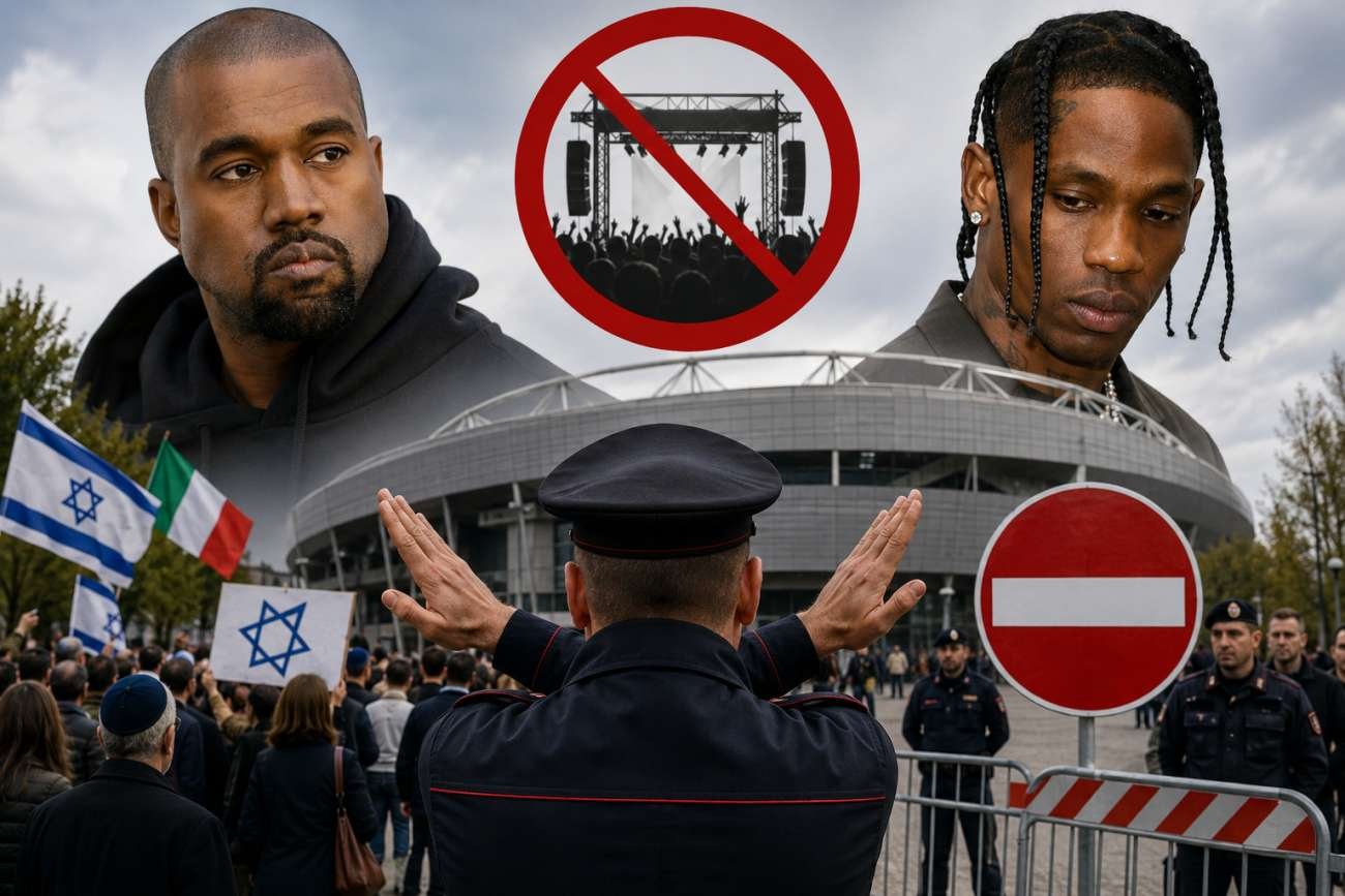 Wide daytime view of the empty RCF Arena in Reggio Emilia, Italy, with faint concert banners and a clear sky overhead, symbolizing the sudden cancellation of the Kanye West and Travis Scott July 2026 shows